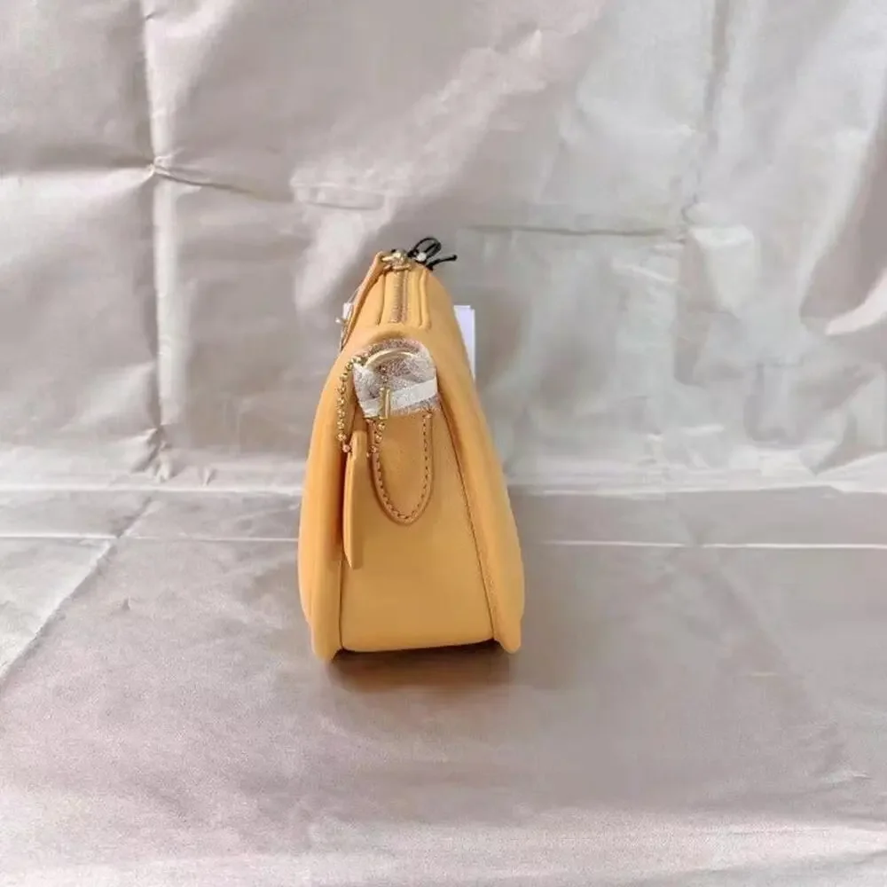 Coach C3490 Swinger 20 With Quilting In Brass/Buttercup